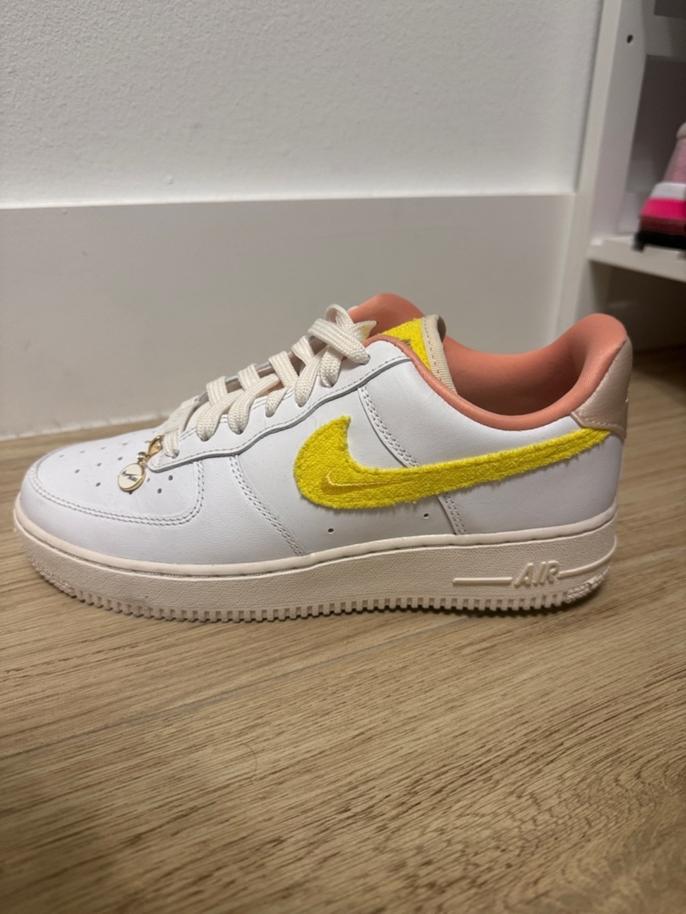 Nike White Leather Sneakers with Yellow Fuzzy Swoosh and Peach Lining